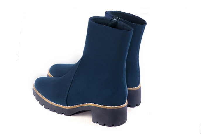 Navy blue women's ankle boots with a zip on the inside. Round toe. Low rubber soles. Rear view - Florence KOOIJMAN
